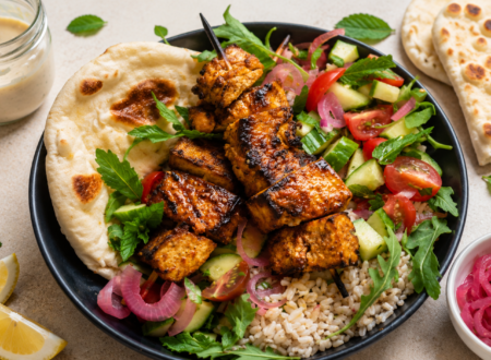 Crispy spiced tofu shawarma served in pita bread with fresh vegetables and creamy sauce.